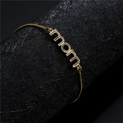 Braccialetto charm mamma oro