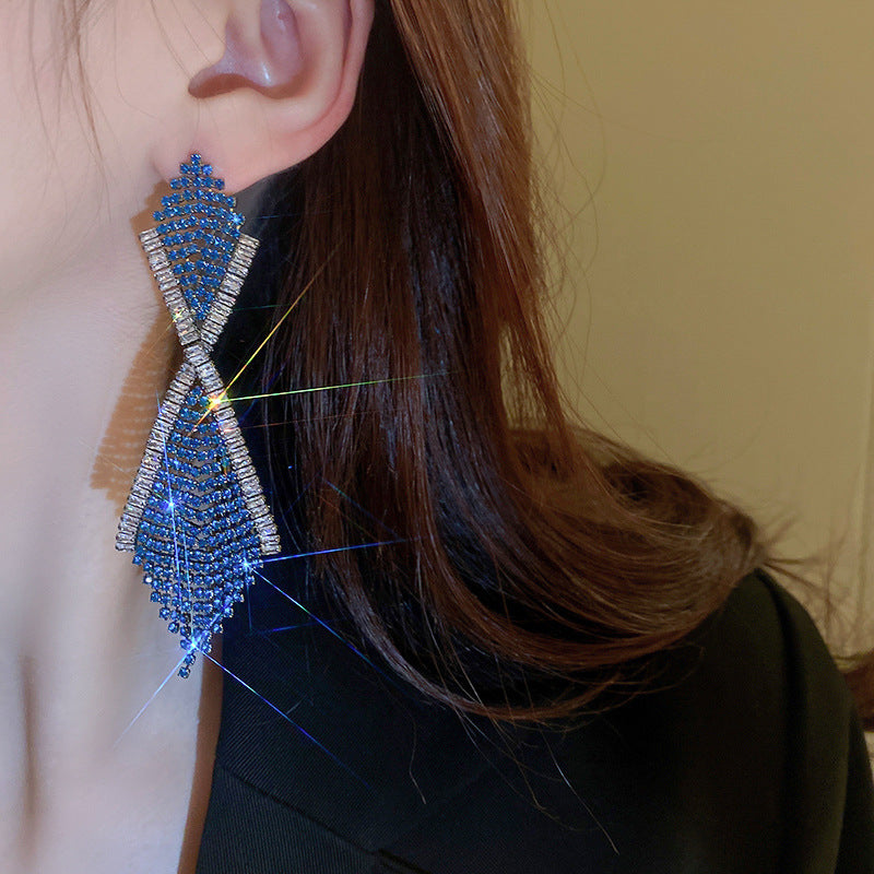 Orecchini nappa geometrici strass