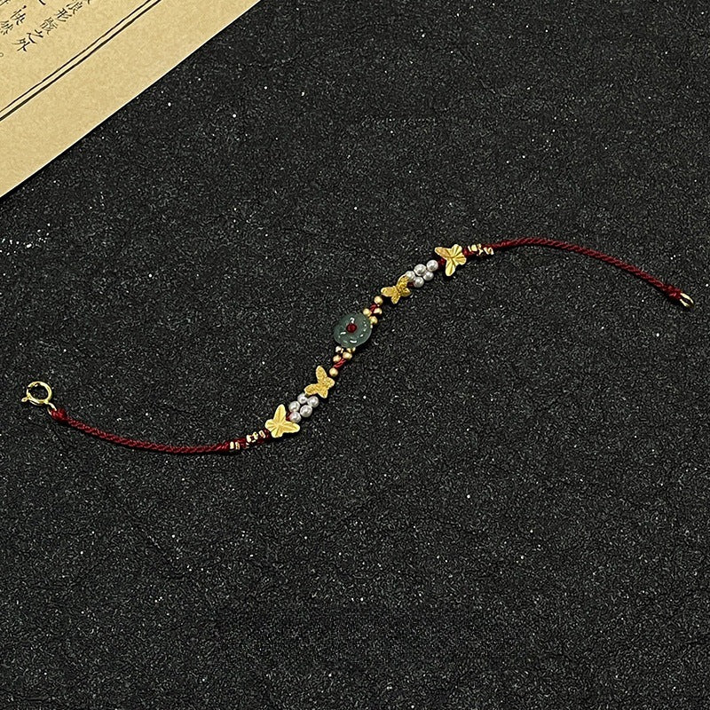 Bracciale farfalla e perle