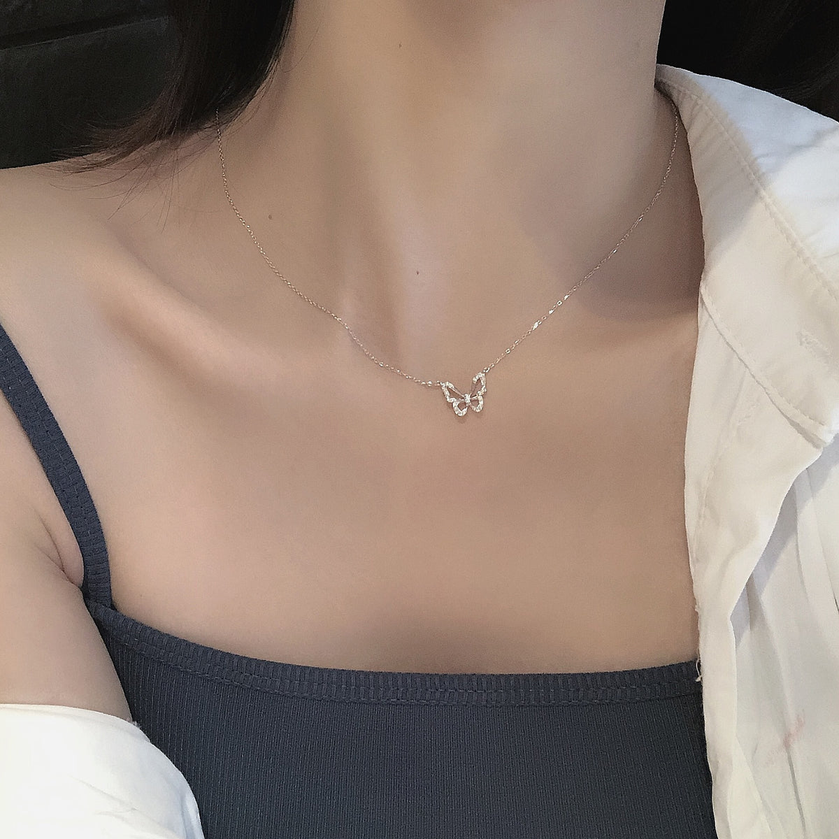 Collana farfalla bicolore placcata