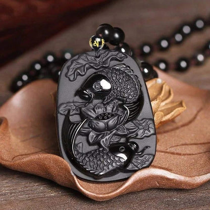 Collana ossidiana pesci