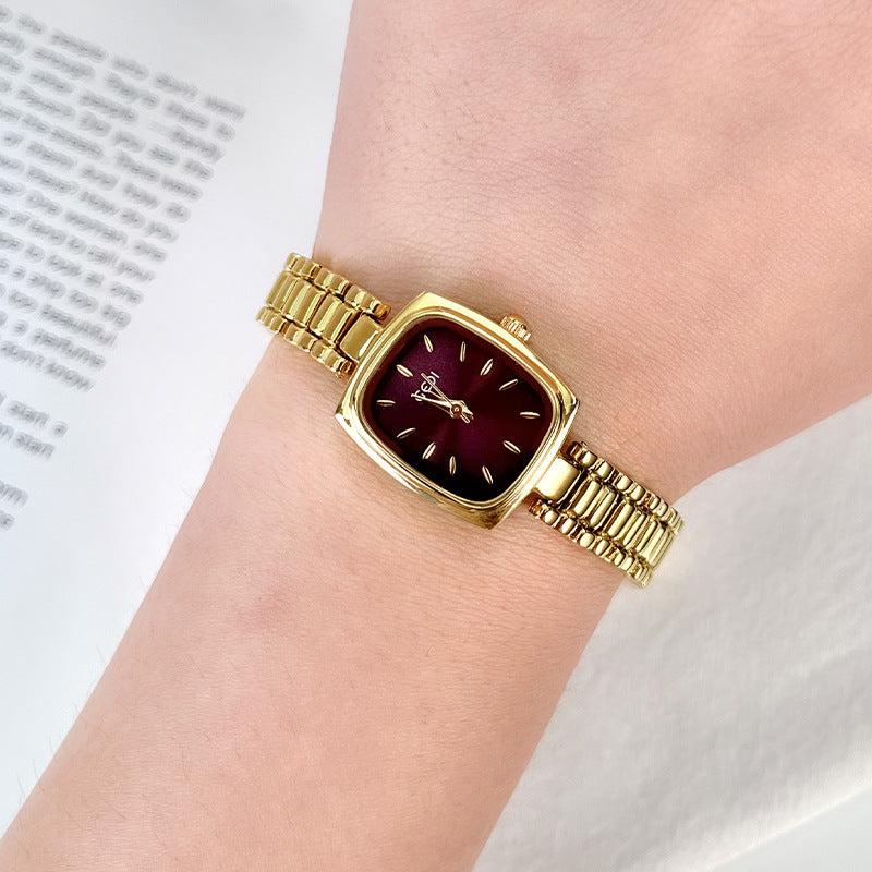 Orologio dorato piccolo