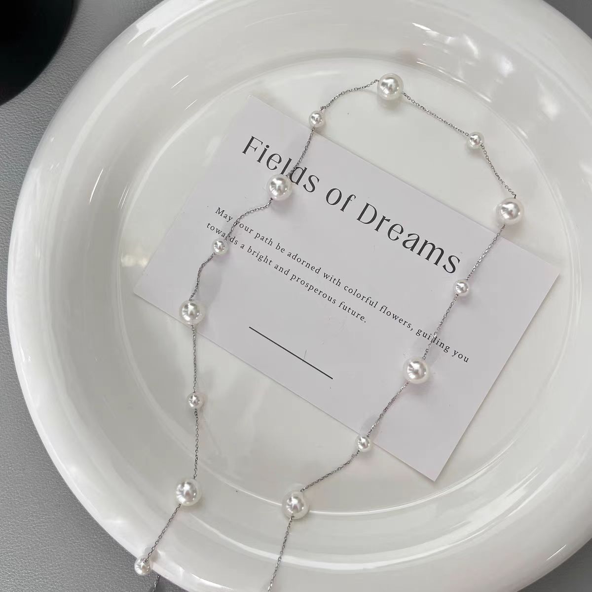 Collana lunga con perle