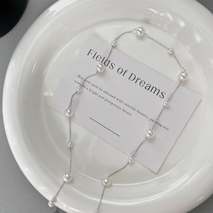 Collana lunga con perle