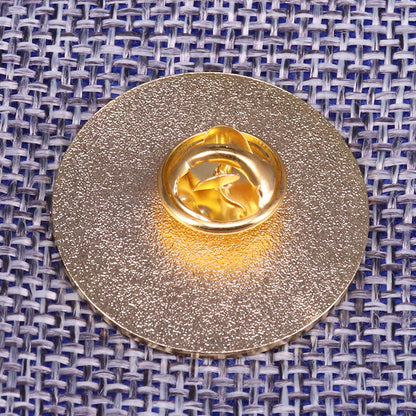 Spilla rotonda in bronzo