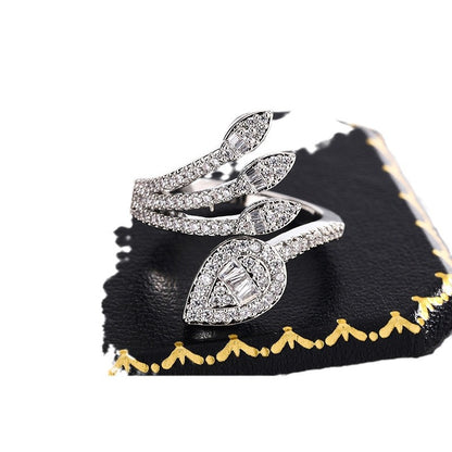 Anello foglie zirconi