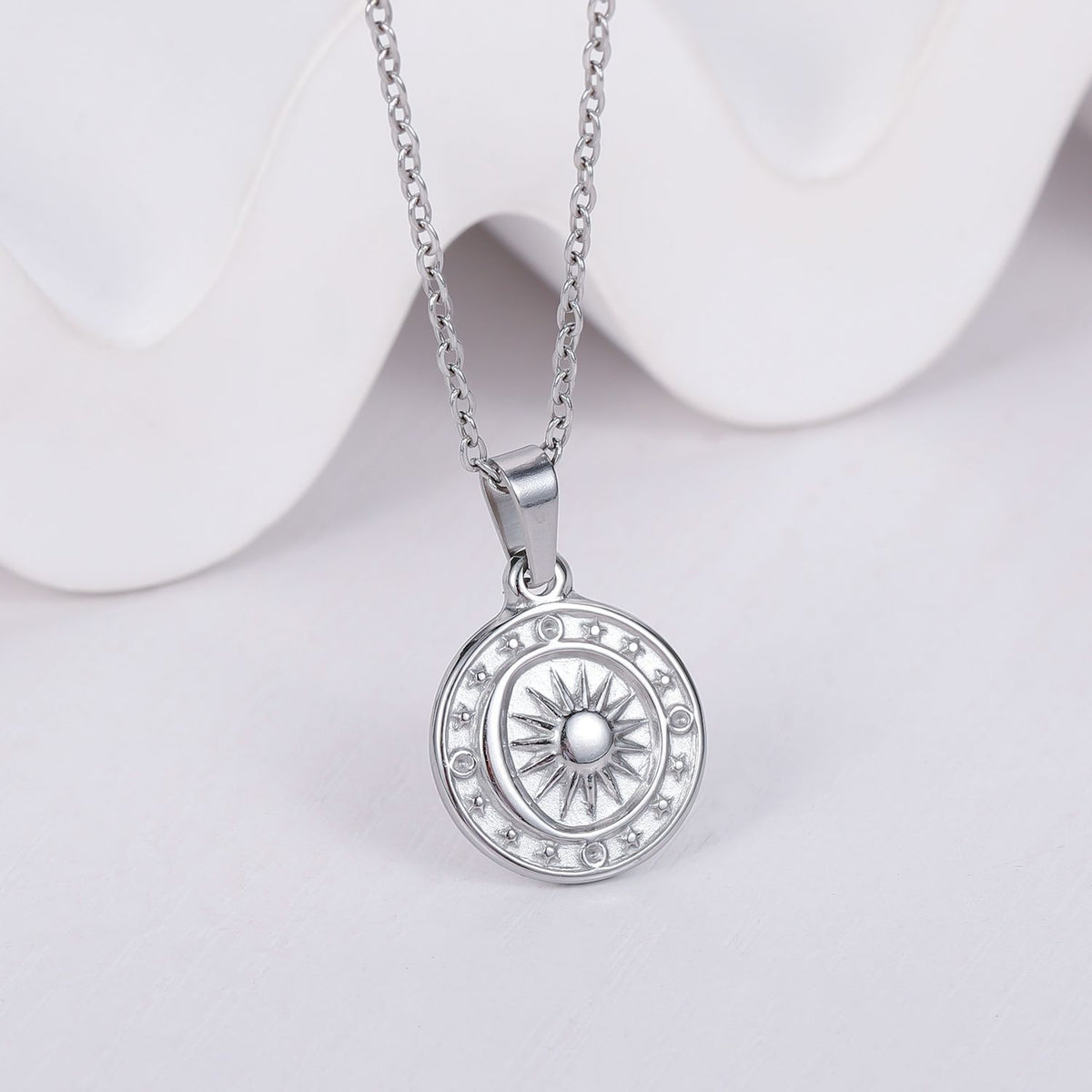 Collana sole luna bussola