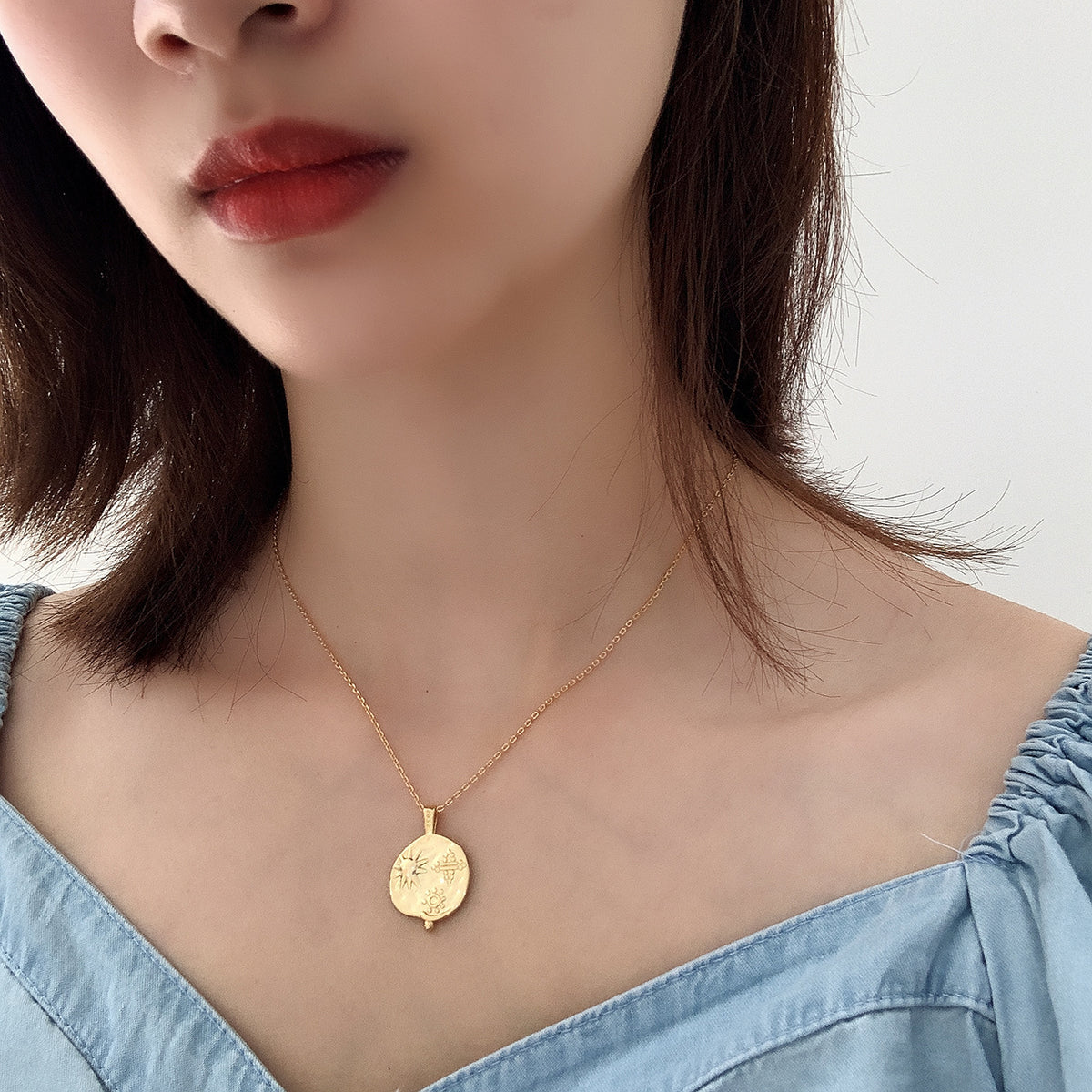 Collana sole e pianeta argento