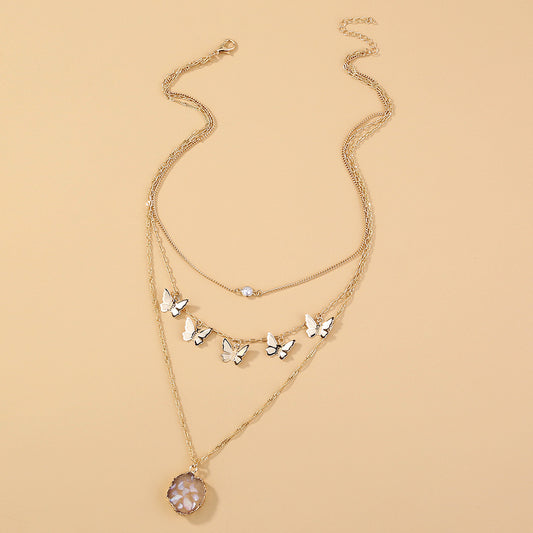 Collana farfalla paillettes
