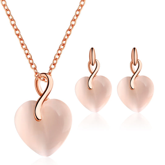 Collana e orecchini opale a cuore