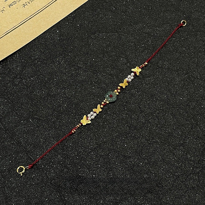 Bracciale farfalla e perle