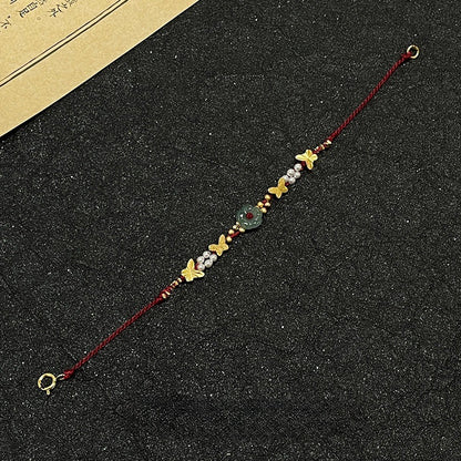 Bracciale farfalla e perle
