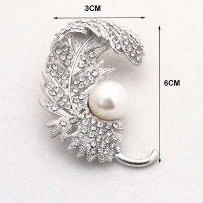 Spilla piuma con strass