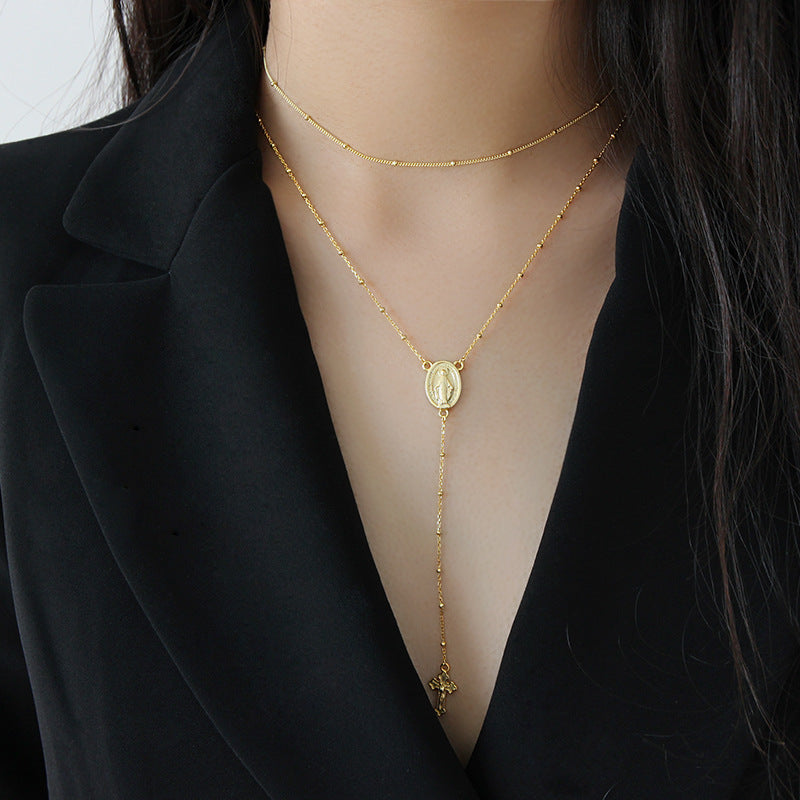 Collana moneta e perle rotonda