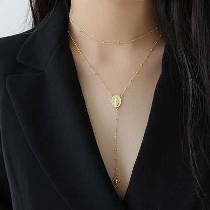 Collana moneta e perle rotonda
