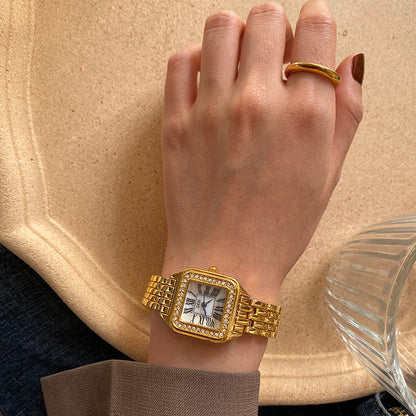 Orologio al quarzo dorato
