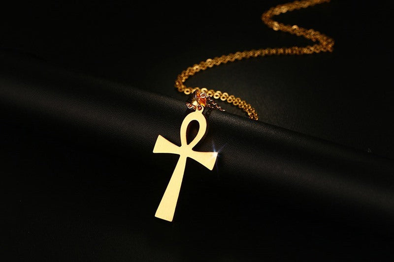 Collana croce dorata acciaio titanio