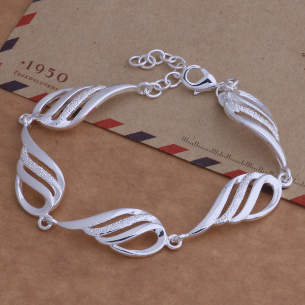 Set gioielli con piume