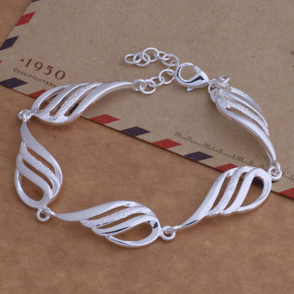 Set gioielli con piume