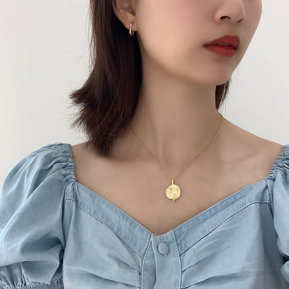 Collana sole e pianeta argento