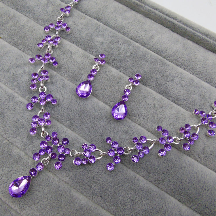 Set orecchini e collana fiori