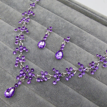 Set orecchini e collana fiori