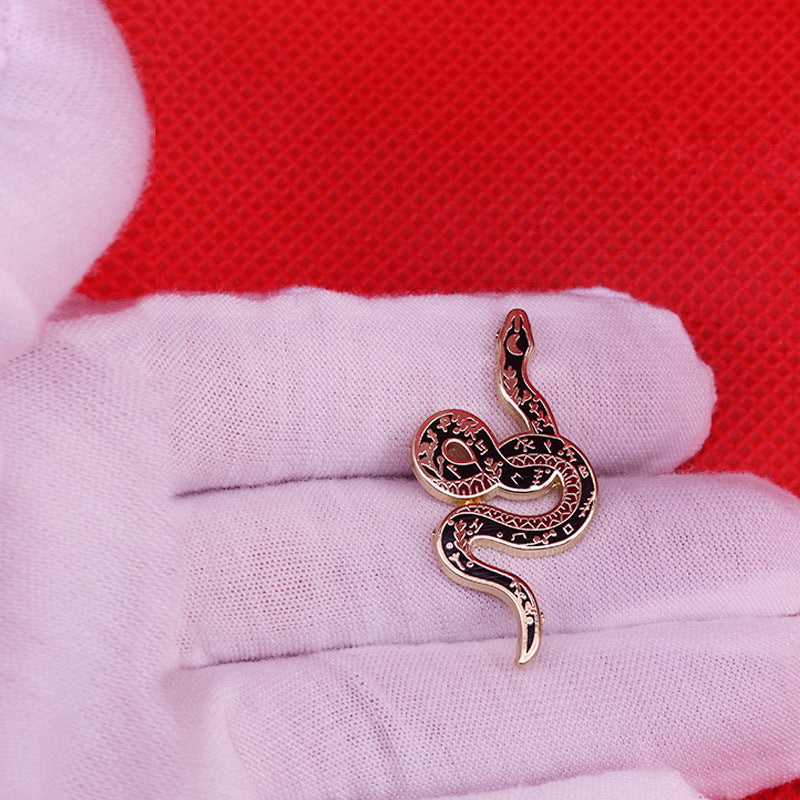Spilla serpente e luna