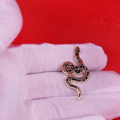 Spilla serpente e luna