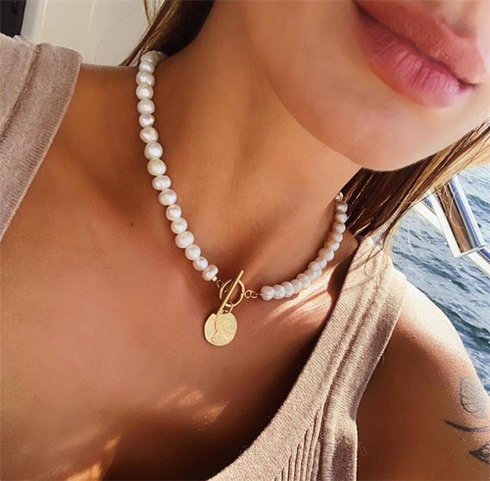 Collana moneta e perle con ciondolo
