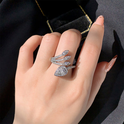 Anello foglie zirconi