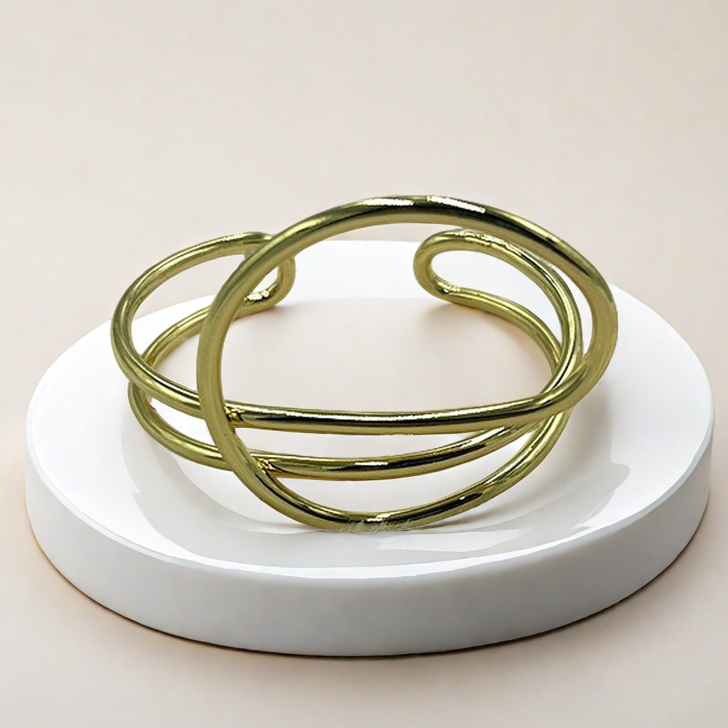 Bracciale geometrico regolabile