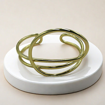 Bracciale geometrico regolabile