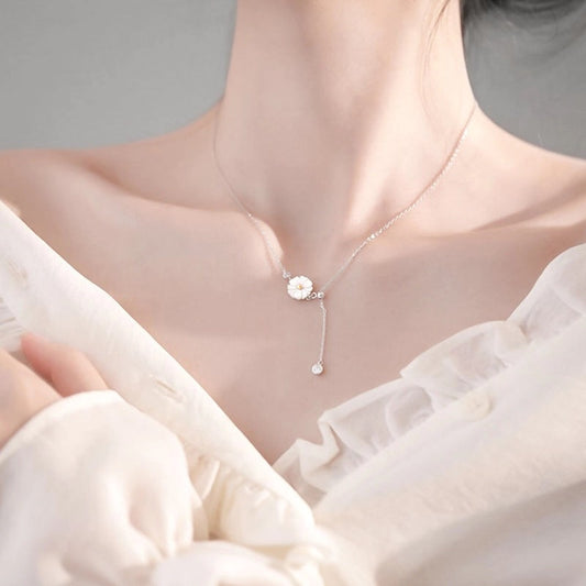 Collana margherita e conchiglia