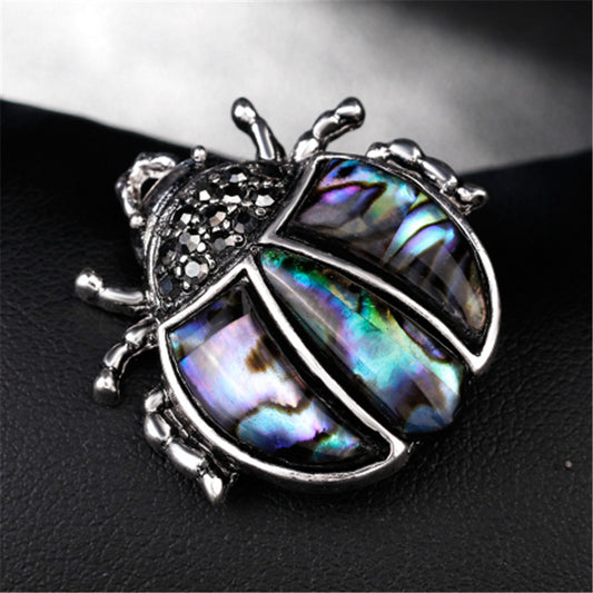 Spilla coccinella argento antico