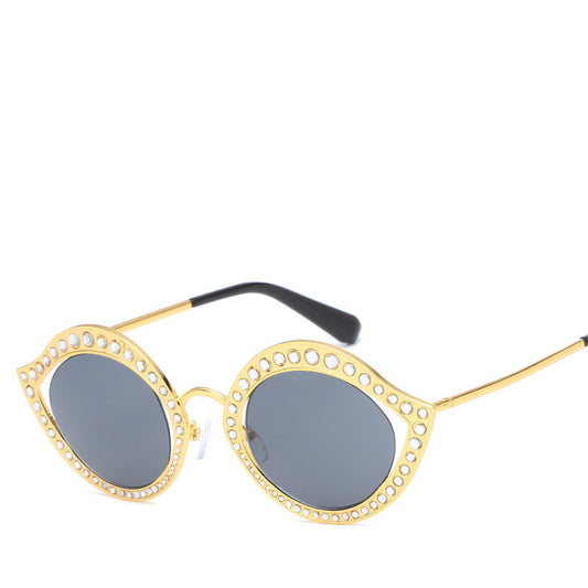 Occhiali cat eye con dettagli diamantati