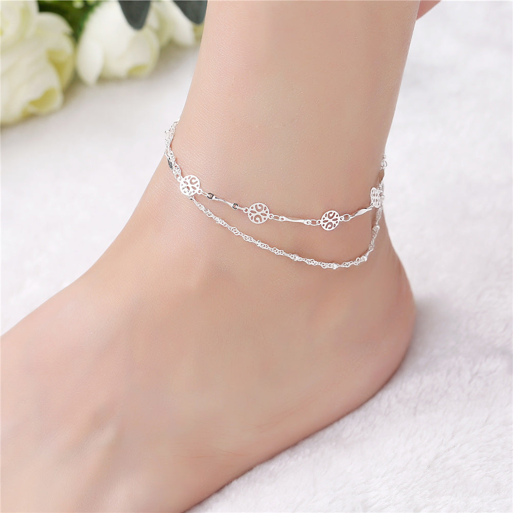 Cavigliera con charm argento