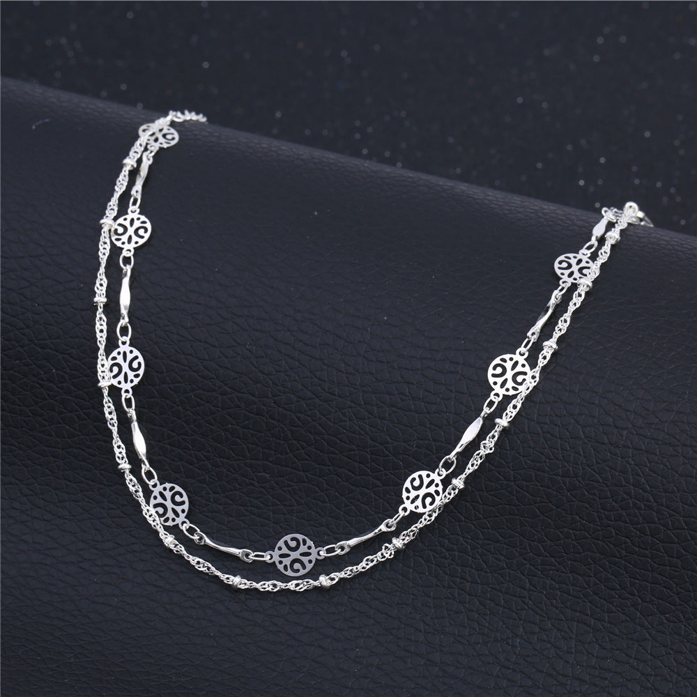 Cavigliera con charm argento