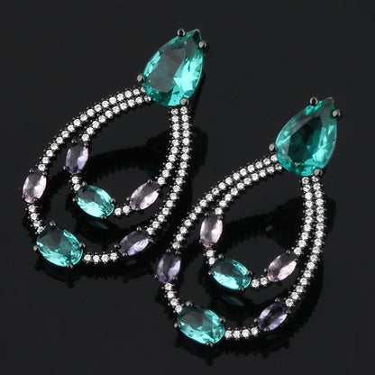 Orecchini goccia verde con zirconi