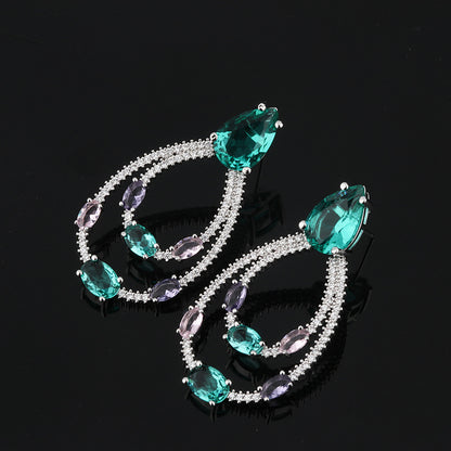 Orecchini goccia verde con zirconi
