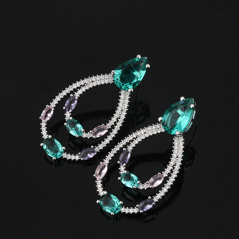 Orecchini goccia verde con zirconi