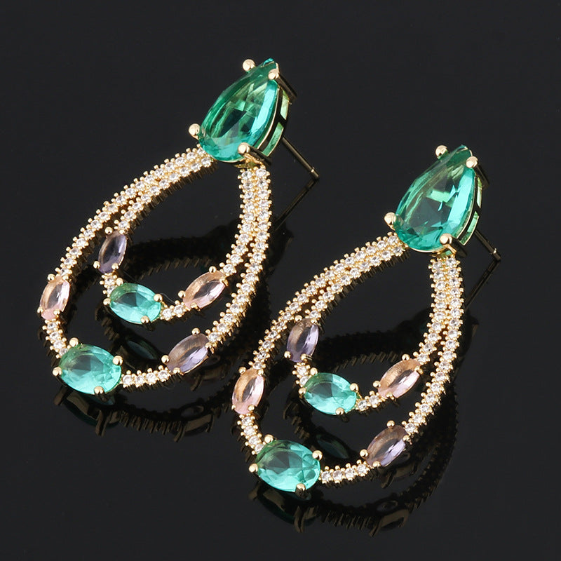 Orecchini goccia verde con zirconi
