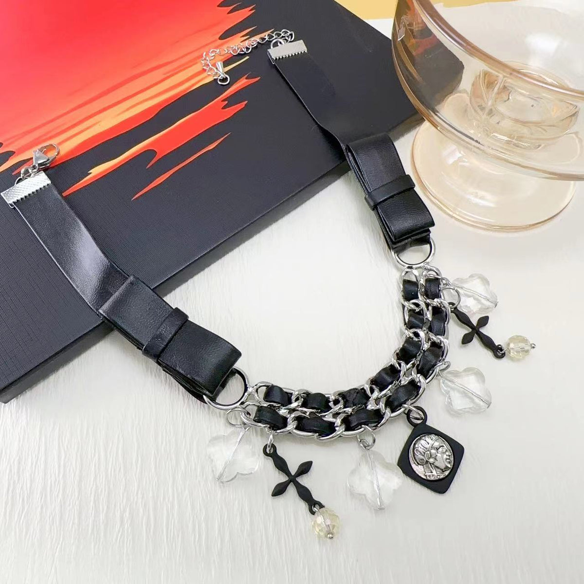 Collana croce pelle intrecciata