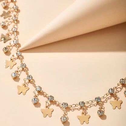 Cavigliera farfalla nappina con strass