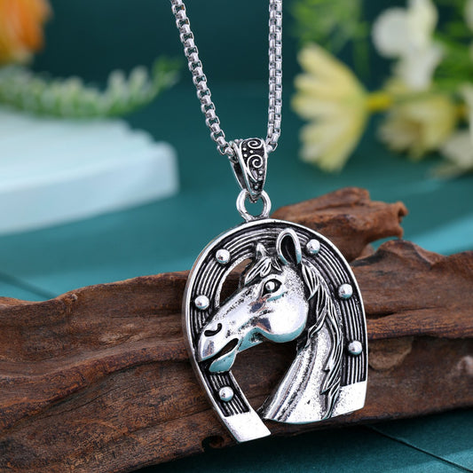 Collana titanio con pendente animale