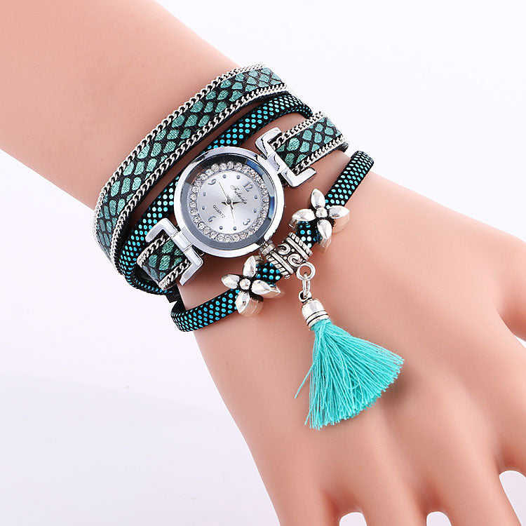 Orologio da donna con fiore e nappa