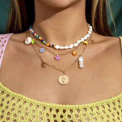 Collana fiori e conchiglie
