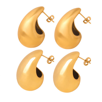 Orecchini goccia dorati in titanio