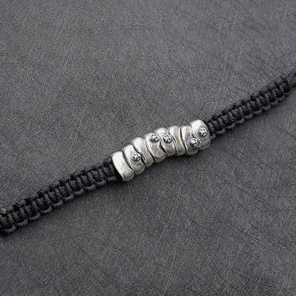 Braccialetto cordino e teschio