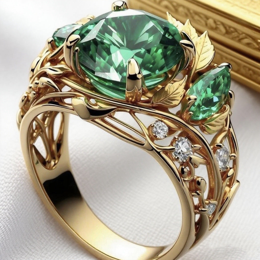 Anello smeraldo e diamanti con decoro floreale
