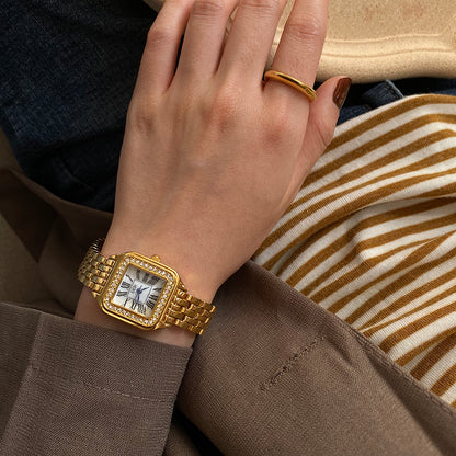 Orologio al quarzo dorato
